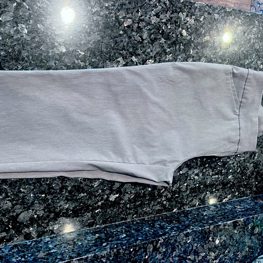Grey Chico’s ankle pants.